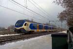 Grey and snowy was 23 January 2019 when NS 2230 passes through Wijchen.