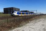 Double flirt Part1: NS 2515 speeds through Tilburg-Reeshof to Dordrecht on 18 March 2022.