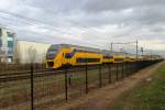 NS 9525 had lost her 'Olympic' advertising livery when passing Wijchen on 14 January 2014.