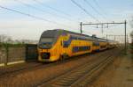 NS 9419 speeds through Nijmegen-Dukenburg on 17 December 2015.