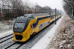 NS 9569 speeds through a snowy Nijmegen-Kolpingburt on 7 January 2017.