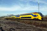 NS 9561 speeds through Tilburg-Reeshof on 21 February 2021.