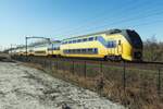 NS 8732 speeds through Tilburg-Reeshof on 8 March 2022.