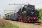 SSN 23 023 hauls a steam train through Alverna on 7 May 2022.