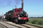 SHM 16 leaves Wognum with a steam train to Hoorn on 28 September 2013.