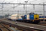 Volker Rail working train BUTCH is hauled out of Nijmegen by 203-4 on 2 August 2012.