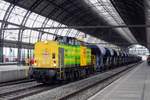 On 25 October 2015 RRF 21 stands at Amsterdam Centraal with an engineering train.