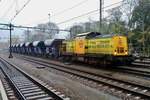 On a rainy 4 November 2017 RRF 24 stands with an engineering train at Dordrecht.