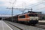 On 4 July 2014 LOCON 9904 lets herself with a block train be photographed at 's-Hertogenbosch by at least a dozen train fans.