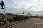 On 26 March 2017, a cluster of photographers stands at the end of the platform in Hoek van Holland Haven while NSM 273 leaves for Rotterdam Centraal on the farewell weekend for the once bristling