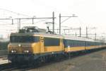 On 24 July 2001, 1858 with ex-DB coaches passed Rotterdam Lombardijen on this scanned analogue picture.