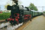 Scanned picture of 65 018, pushing a steam shuttle out of Dordrecht Centraal on 2 July 2002 during the biannual 'Dordt in Stoom' festival.