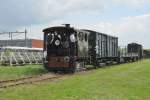 MBS-2 tram locomotive hauls a freight wagon at Goes on 17 May 2013 during a steam festival.