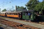 On 28 October 2013 SHM-18 hauls a steam tram out of Hoorn toward Medemblik.