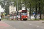 HTM 3049 in Delft. Line 1. The street is going uphill. That's why the tram isn't running equal on the photo.

Date: 9. October 2011.