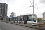 RET 2045 on Line 20 from Rotterdam Centraal to Kreekhuizenlann on the Erasmusbridge. The Tram is a model Citadis.

Date: 7. October 2011.

The bridge is not equal - that's why the tram is going uphill on the photo.