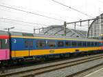 ICR Second class coach number 50 84 20-70 543-8 build in 1986. Former AB Benelux coach. Track 13 Amsterdam Centraal Station 25-03-2015.