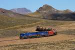 PeruRail 752 and 754 lead their loaded tank car train through the Altiplano of the Andes at around 3800m a.s.l. towards Juliaca. Location is near Pillones.