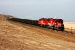 SPCC 61 ( SD70 ) and 32 ( GP40 ) descend from the desert to the sealevel