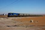 Perurail 751 with a train of containers full of acid liquids for the mines.