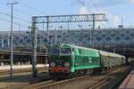 SU45-079 hauls an extra train from Wolsztyn out of Poznan Glowny on the evening of 4 May 2024 on a round trip on Poznan's  tracks.