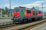 PoPoBo: Polish EP09-023 wearing the Portuguese flag during the UEFA-2012 advertisement campaign, is about to get coupled to EuroCity JAN SOBIESKI at the Czech border station of Bohumin on 30 May 2012.