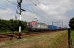 Long interloper: PKP Cargo EU46-515 hauls a container train through Wijchen toward Tilburg-Industrie on 1 August 2020.