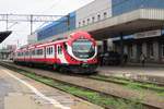 Refurbished EN57-1434 stands ready for departure at Poznan Glowny on 5 June 2013.