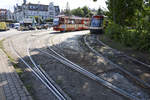 Trams on the circle in Gdansk-Oliwa: DUEWAG N8C-NF (1162) and Pesa 120Na (1041).