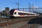 SBB 521 025 gets photographed near Pratteln from a public space on 13 February 2024.