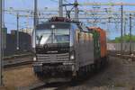 RTB Cargo 193 179 hauls a container train through Breda on 11 June 2025.
