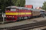 ZSSK 751 131 shunts older stock in the depot of Benesov u Prahy on a grey 26 September 2025.