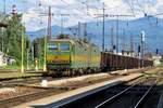 Coal train with 131 043 thunders through Vrutky on 14 May 2018.