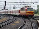 ZSSK 240 118 enters Bratislava hl.st. on 19 September 2017 while a rain shower unleases itself above the train.