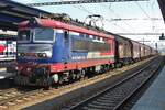 Steel train with LokoRail 242 555 passes Breclav on 2 June 2015.