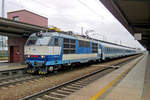 On a rainy 4 June 2013, ZSSK 350 013 calls at Pardubice with a Budapest-bound EC.