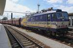 ZSCS 363 105 hauls a coal train through Trnava on 24 June 2022.