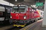 Electric locomotive 383 104-7 is ready for departure at the platform of Vienna's main train station. MAY 3, 2026
