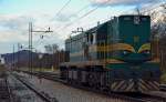 Diesel loc 644-025 is running through Maribor-Tabor on the way to Studenci station. /3.12.2012