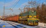 Diesel loc 644-018 is hauling freight train through Maribor-Tabor on the way to Tezno yard. /11.12.2012