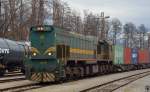 Diesel loc 664-107 with container train from Hodo is arriving at Pragersko station.