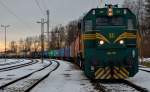 Diesel loc 664-105 with container train is leaving Pragersko on the way to Hodo¨. /29.1.2013