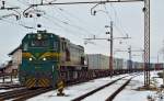 Diesel loc 664-108 with container train from Hodo¨ is approaching Pragersko station. /29.1.2013
