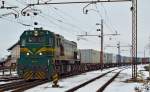 Diesel loc 664-108 with container train from Hodo is approaching Pragersko station.