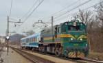 Diesel loc 664-108 pull passenger train through Maribor-Tabor on the way to the south.