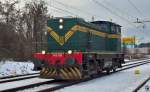 Diesel loc 643-028 is running through Maribor-Tabor on the way to Maribor station. /14.12.2012