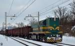 Diesel loc 644-025 pull freight train through Maribor-Tabor on the way to Tezno yard.