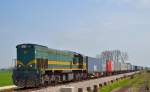 Diesel loc 664-104 is hauling container train through Gaj on the way to Koper port. /17.4.2013