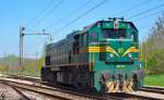 Diesel loc 664-112 is running through Maribor-Tabor on the way to Spielfeld. /25.4.2013