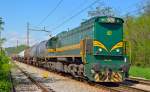 Diesel loc 664-105 is hauling freight train through Maribor-Tabor on the way to Tezno yard. /3.5.2013